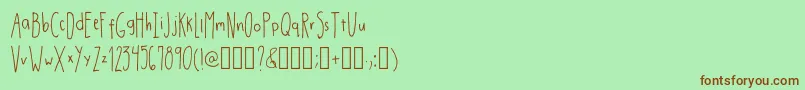 Шрифт DrmhandwrittenthinRegular – коричневые шрифты на зелёном фоне
