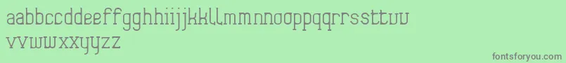 フォントFrida01 – 緑の背景に灰色の文字