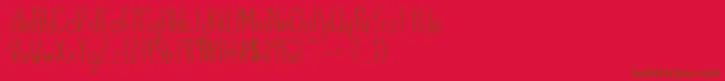 Fonte IndieSummerunfilled – fontes marrons em um fundo vermelho