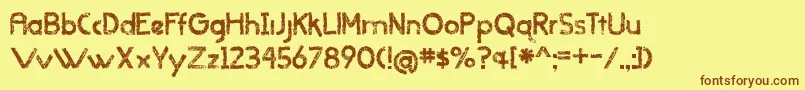 BmdWhenItRainsOldVersion Font – Brown Fonts on Yellow Background