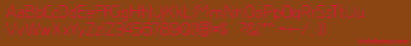 Greyscalebasic-Schriftart – Rote Schriften auf braunem Hintergrund