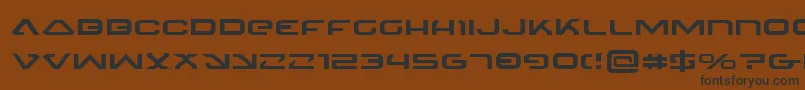 4114BlasterExpanded Font – Black Fonts on Brown Background