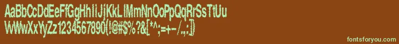 フォントShock – 緑色の文字が茶色の背景にあります。