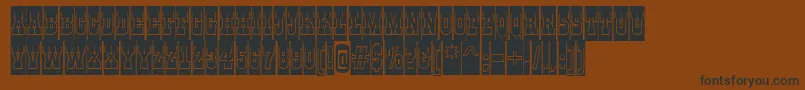 AGildiatitulcmgrBold-Schriftart – Schwarze Schriften auf braunem Hintergrund