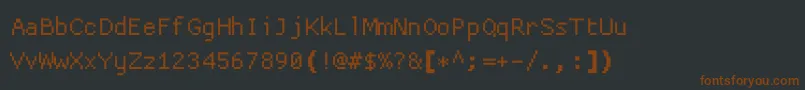 Fonte Proggycleanttszbp – fontes marrons em um fundo preto