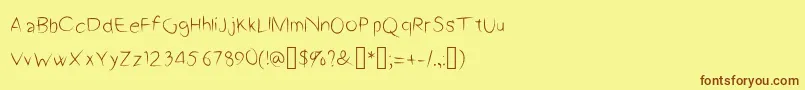 フォントA2Script – 茶色の文字が黄色の背景にあります。