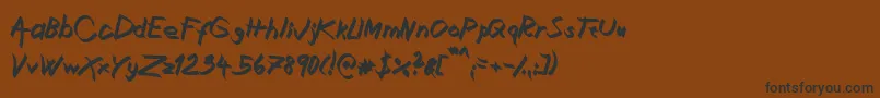 Шрифт XaligraphyBolditalic – чёрные шрифты на коричневом фоне