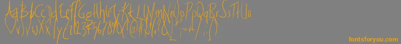 フォントFrightnight – オレンジの文字は灰色の背景にあります。