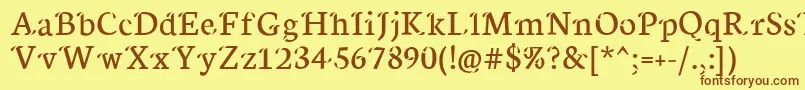 フォントXisfani – 茶色の文字が黄色の背景にあります。