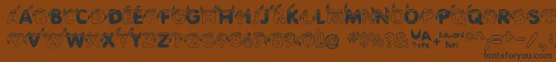 EdbIndians-fontti – mustat fontit ruskealla taustalla