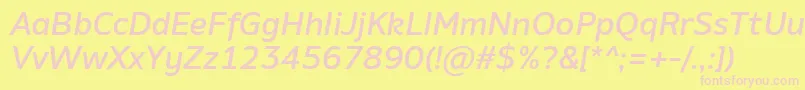 AminoMediumItalic-fontti – vaaleanpunaiset fontit keltaisella taustalla