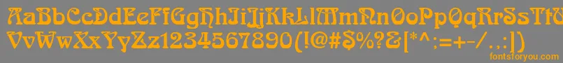 フォントArnoldboecklinstd – オレンジの文字は灰色の背景にあります。