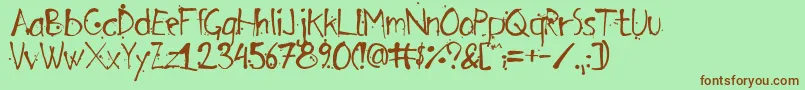 ArensdorffInk Font – Brown Fonts on Green Background