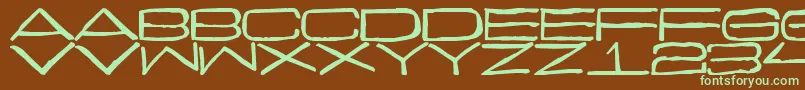 フォントCurmudgeonly – 緑色の文字が茶色の背景にあります。