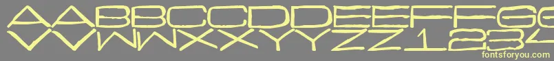 Шрифт Curmudgeonly – жёлтые шрифты на сером фоне
