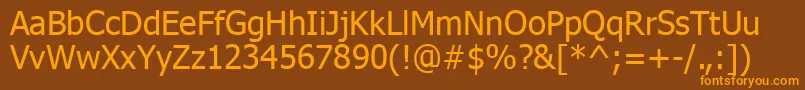 TahomaKoi8 Font – Orange Fonts on Brown Background