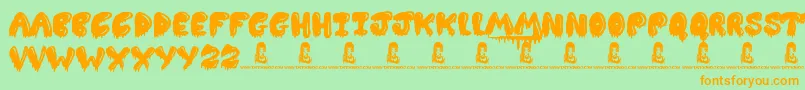 Slimed Font – Orange Fonts on Green Background