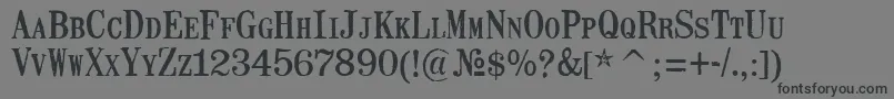 MailartrubberstampRegular-Schriftart – Schwarze Schriften auf grauem Hintergrund
