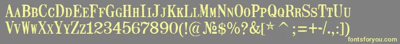 MailartrubberstampRegular Font – Yellow Fonts on Gray Background