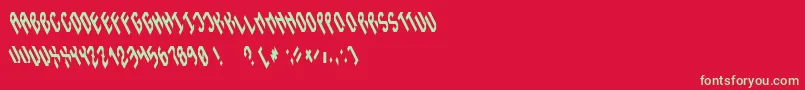 フォントInstability – 赤い背景に緑の文字