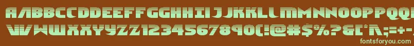 フォントNinjagardenhalf – 緑色の文字が茶色の背景にあります。