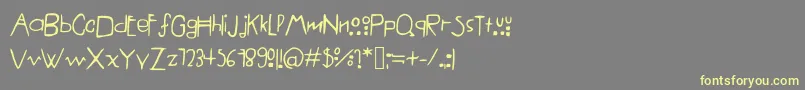 フォントAmericanHorrorStory%281%29 – 黄色のフォント、灰色の背景