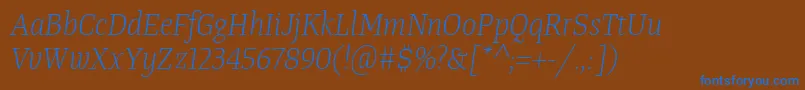フォントTangerserifnarrowulLightitalic – 茶色の背景に青い文字