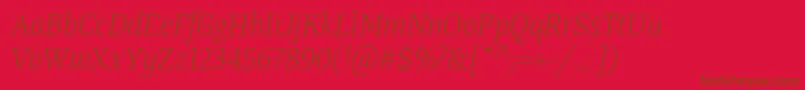 Шрифт TangerserifnarrowulLightitalic – коричневые шрифты на красном фоне