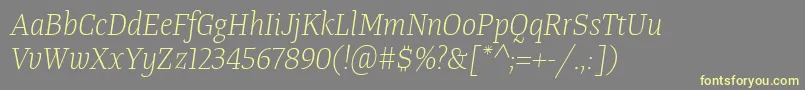 Fonte TangerserifnarrowulLightitalic – fontes amarelas em um fundo cinza