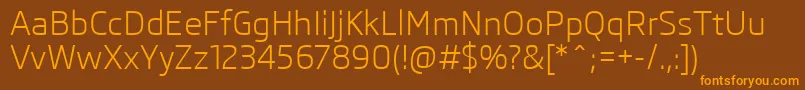 SkodaPro-Schriftart – Orangefarbene Schriften auf braunem Hintergrund