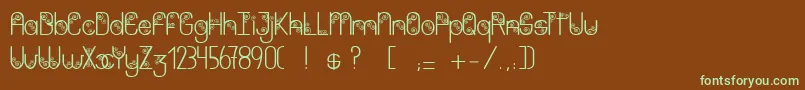 フォントPurpleshadow – 緑色の文字が茶色の背景にあります。