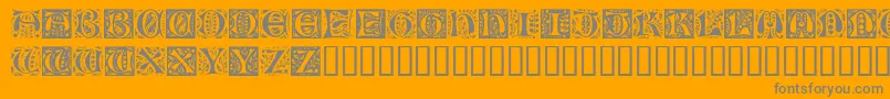 RamoCaps-Schriftart – Graue Schriften auf orangefarbenem Hintergrund