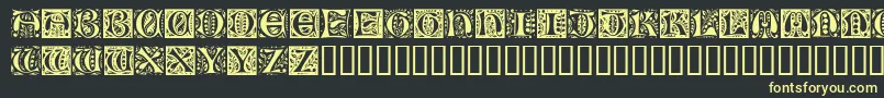RamoCaps Font – Yellow Fonts on Black Background