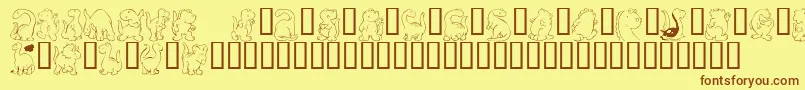 Шрифт KrNickysDinos – коричневые шрифты на жёлтом фоне