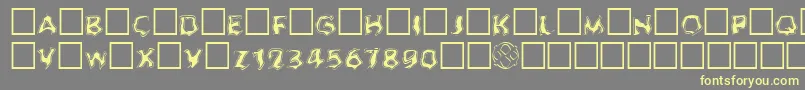Ghoulofill Font – Yellow Fonts on Gray Background