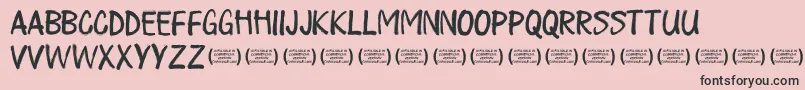 PlayalldayRegular-Schriftart – Schwarze Schriften auf rosa Hintergrund