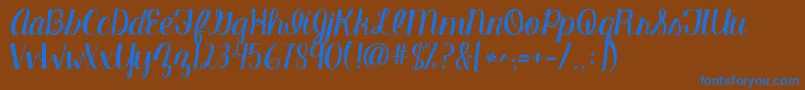 Kgmanhattanscript Font – Blue Fonts on Brown Background
