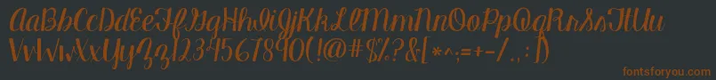 Kgmanhattanscript Font – Brown Fonts on Black Background