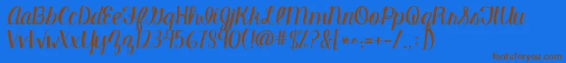Kgmanhattanscript Font – Brown Fonts on Blue Background