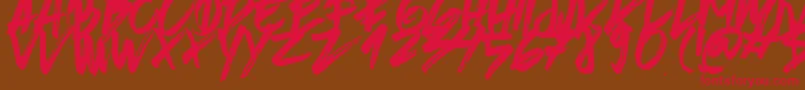 BrushedTraveler Font – Red Fonts on Brown Background