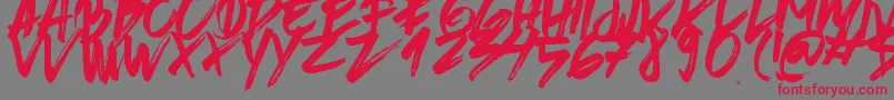 BrushedTraveler Font – Red Fonts on Gray Background