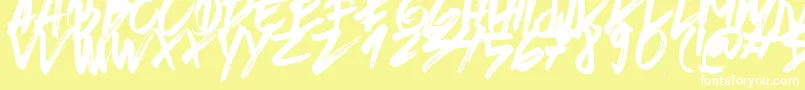 フォントBrushedTraveler – 黄色い背景に白い文字