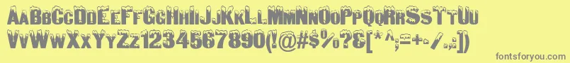 SnowCapsNormal Font – Gray Fonts on Yellow Background