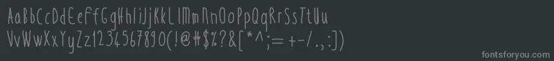 フォントThintall – 黒い背景に灰色の文字