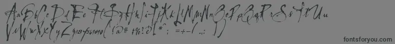 Lassiguedmato-Schriftart – Schwarze Schriften auf grauem Hintergrund