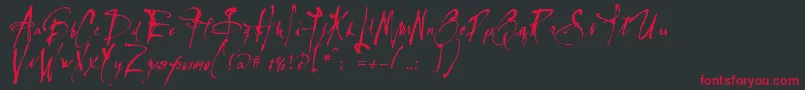 Lassiguedmato Font – Red Fonts on Black Background