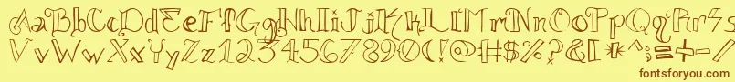 Knuckle.Tatz Font – Brown Fonts on Yellow Background