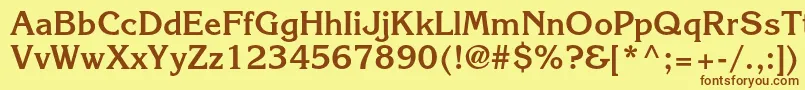 フォントKorinnastdBold – 茶色の文字が黄色の背景にあります。