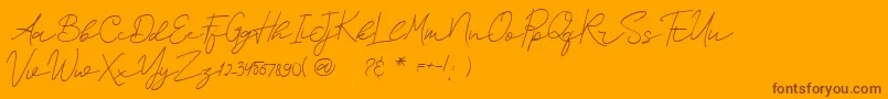 Fonte SurederStylishDemo – fontes marrons em um fundo laranja