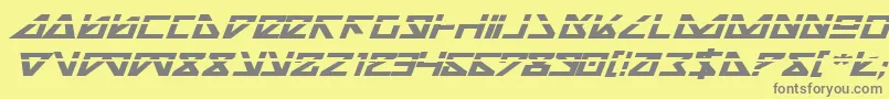 NickTurboBoldExpandedItlas-fontti – harmaat kirjasimet keltaisella taustalla